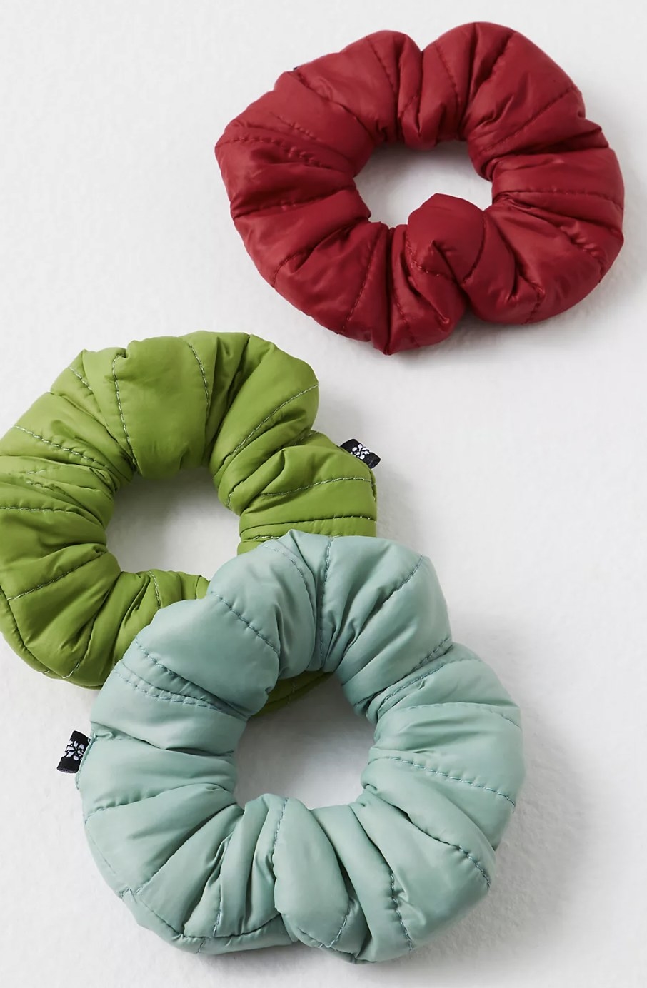 the scrunchie in blue green and red