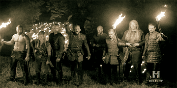 A group of viking warriors prepare for a massive battle