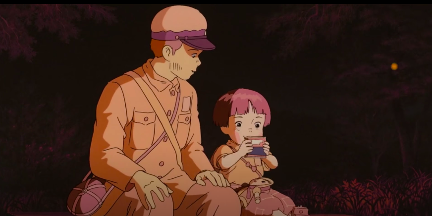 A man and a child sit together