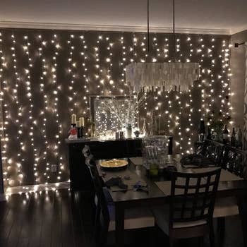 A reviewer's dining room with the white fairy lights strung on the wall