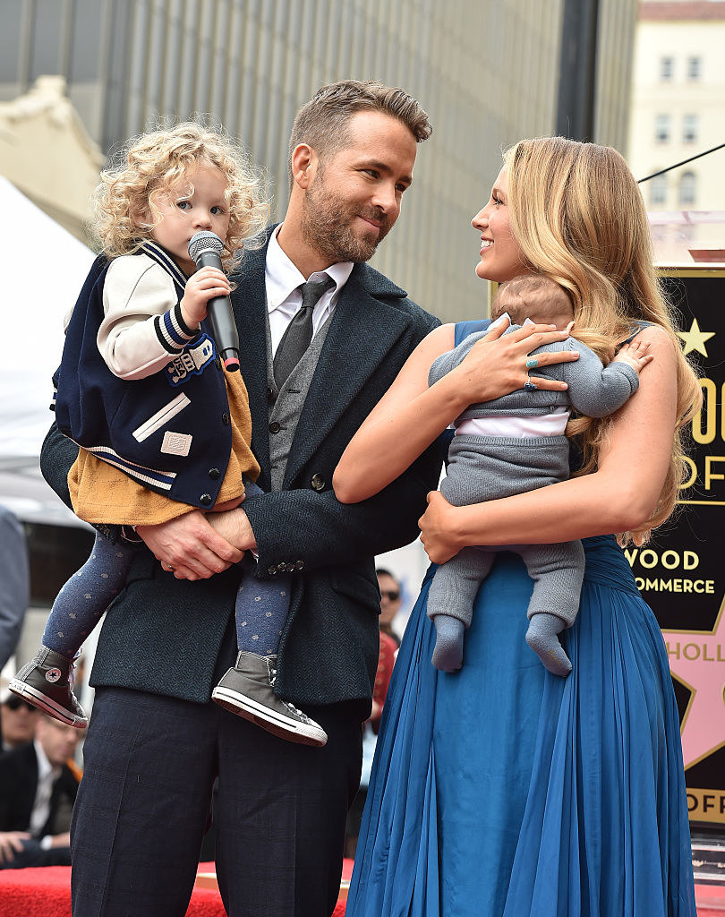 Actors Ryan Reynolds and Blake Lively with daughters James Reynolds and Ines Reynolds on the red carpet