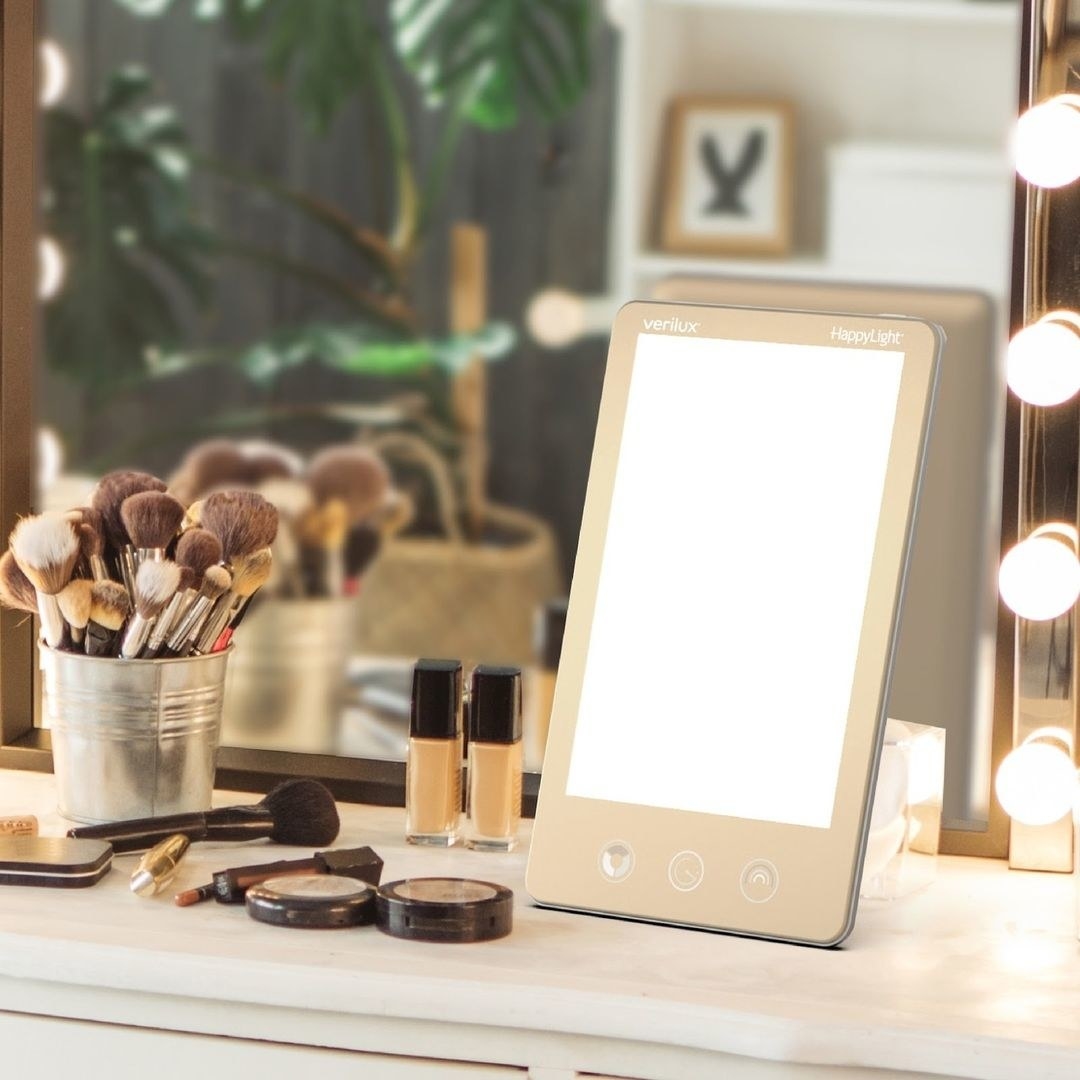 the light therapy lamp on a makeup vanity