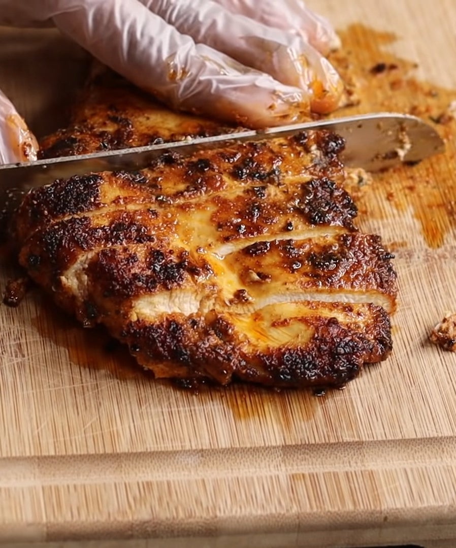 cajun chicken being cut