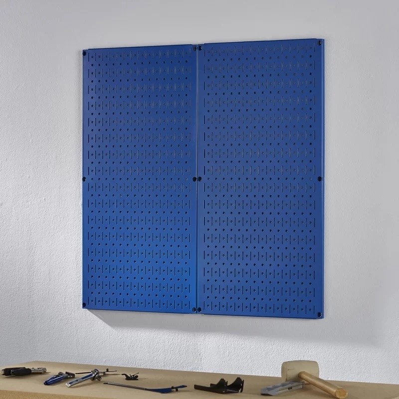 A blue metal peg board