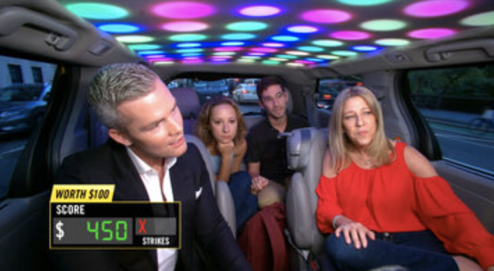 Screenshot of people inside a car