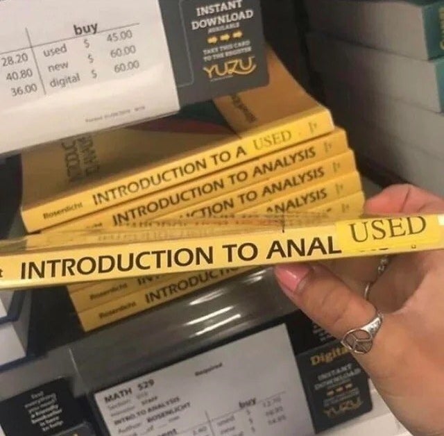 a "used" sticker covering part of the word "analysis" so it looks like "anal"