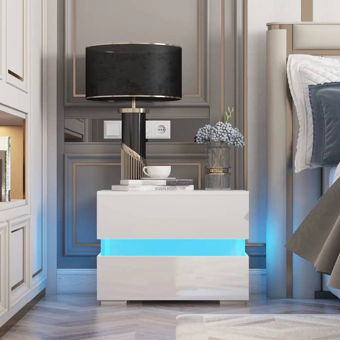 The nightstand with the LED light on blue