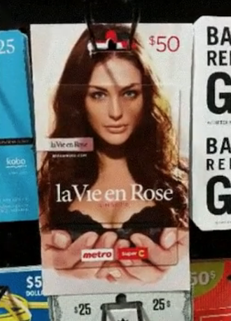 two gift cards stacked together that make it look like someone holding boobs