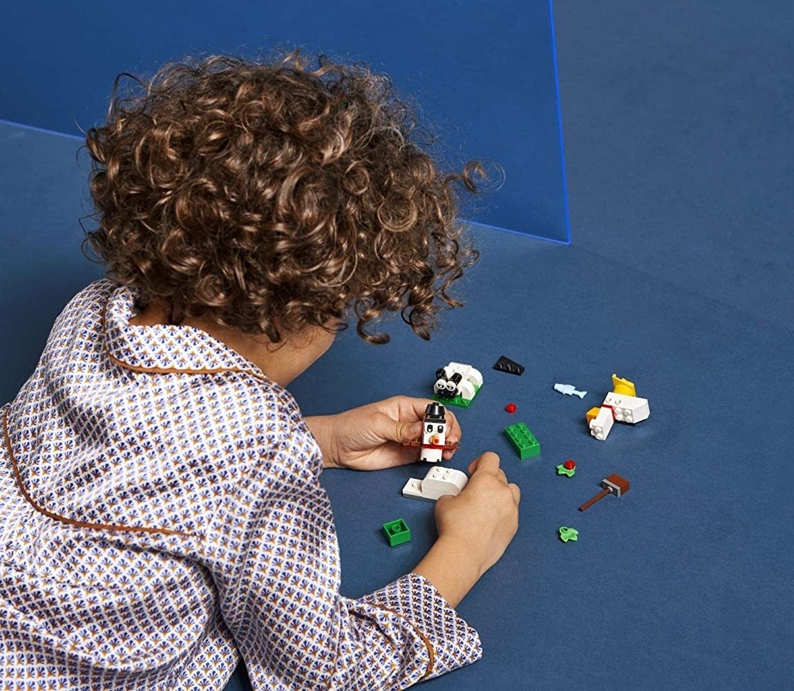child playing with the LEGO set