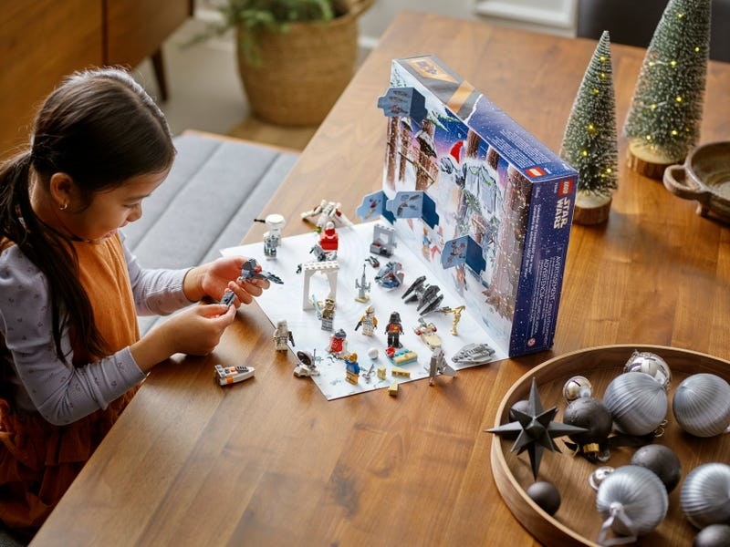 kid with Star Wars advent calendar