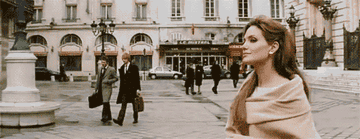 A woman walking in Paris