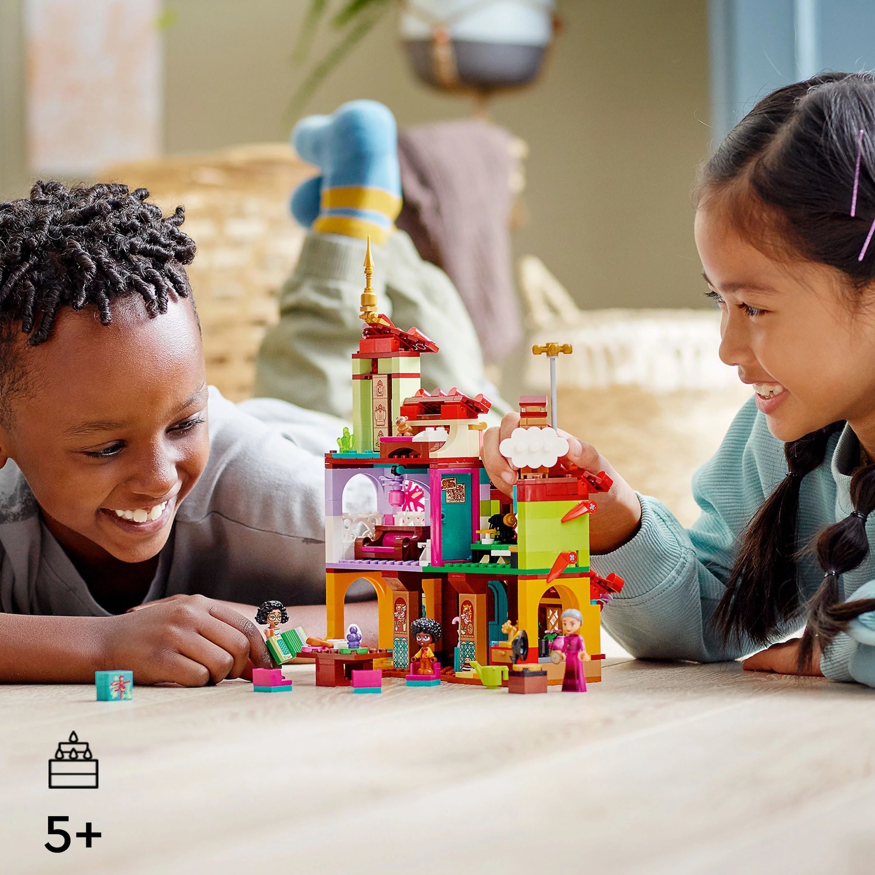 Two children playing with Legos