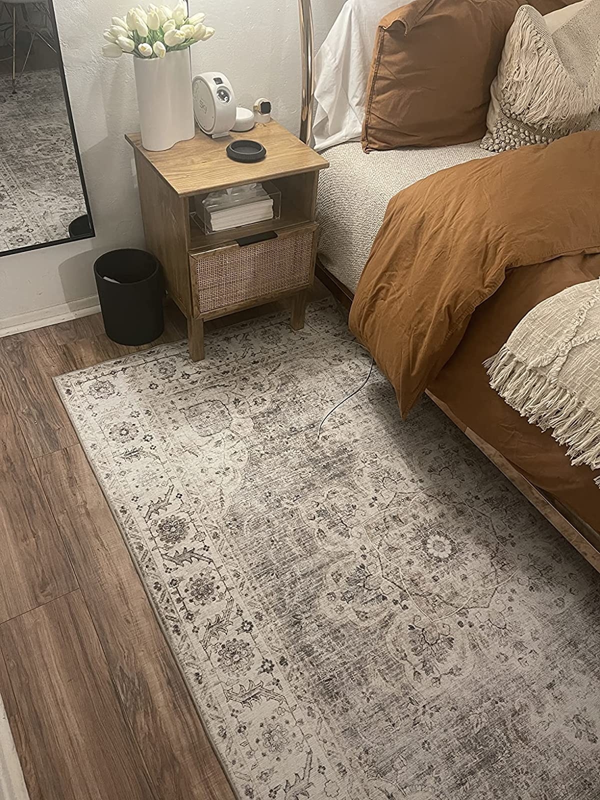 Reviewer&#x27;s rug is shown in a bedroom