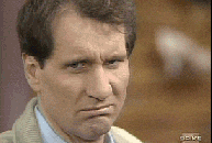 Ed Harris makes faces at the camera in Married with Children