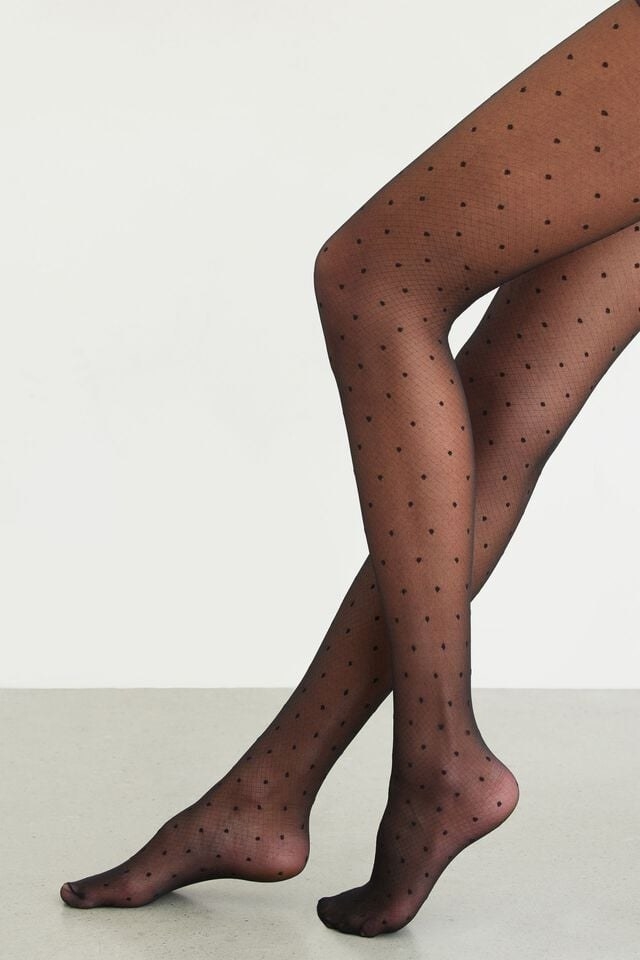 someones legs wearing the tights