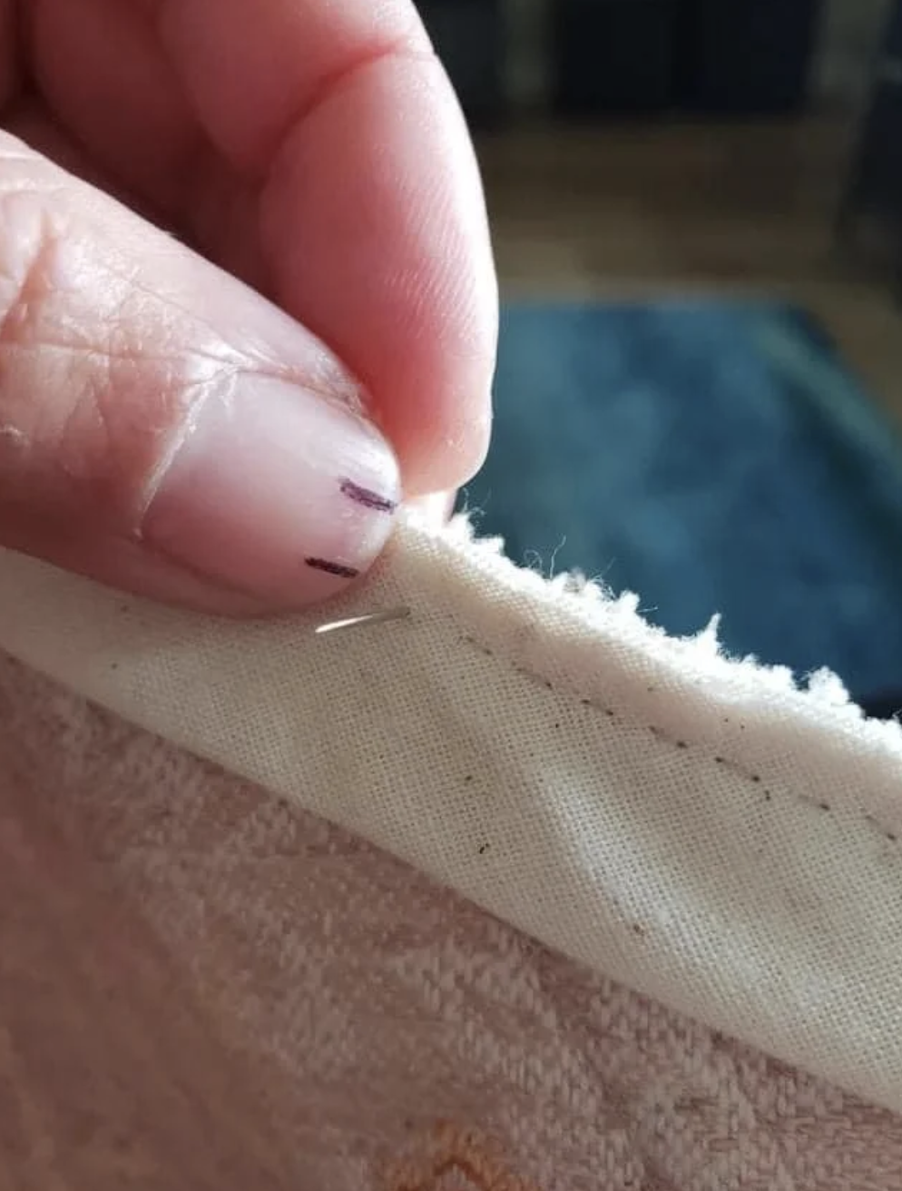 Closeup of someone sewing
