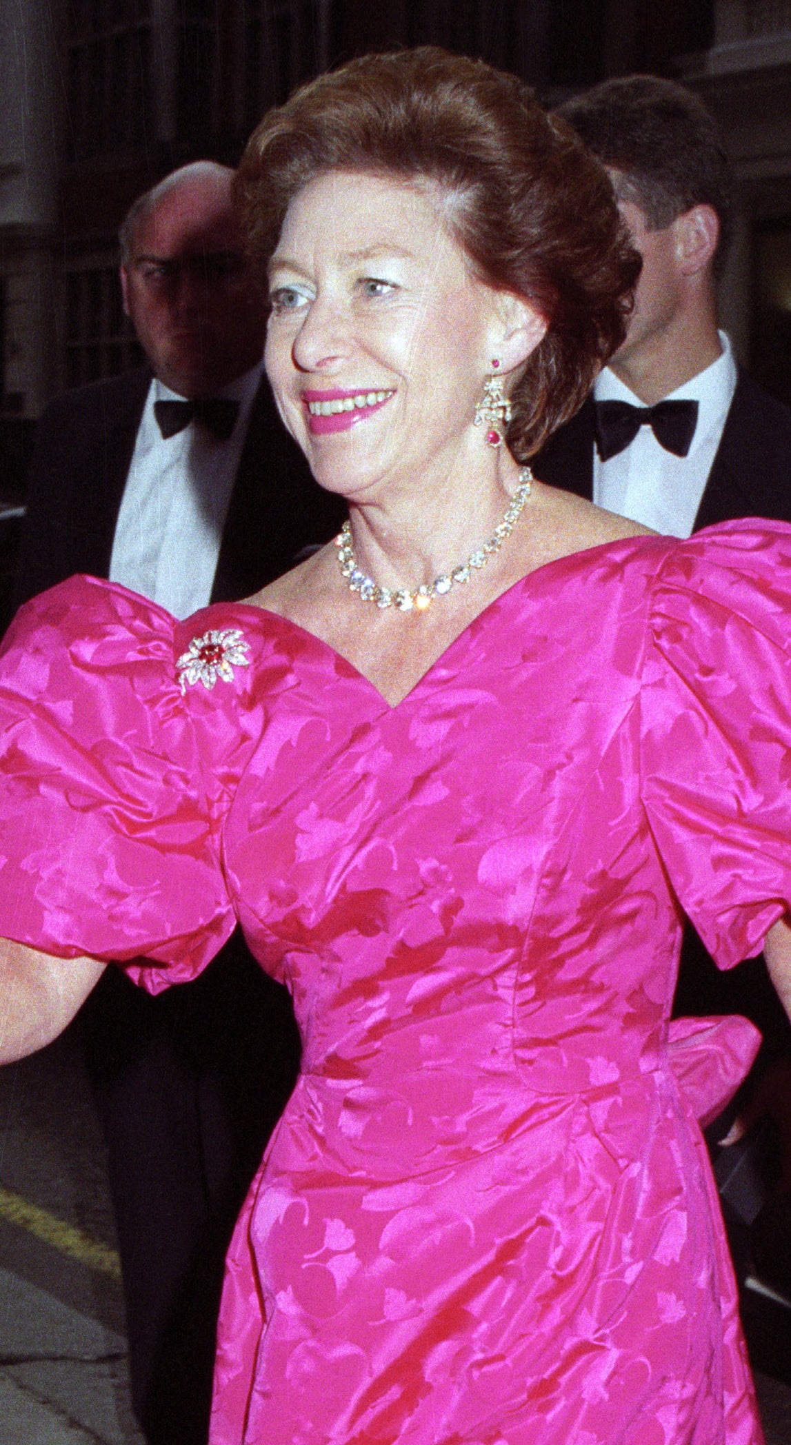 Princess Margaret in a formal pink dress with voluminous pink shoulders