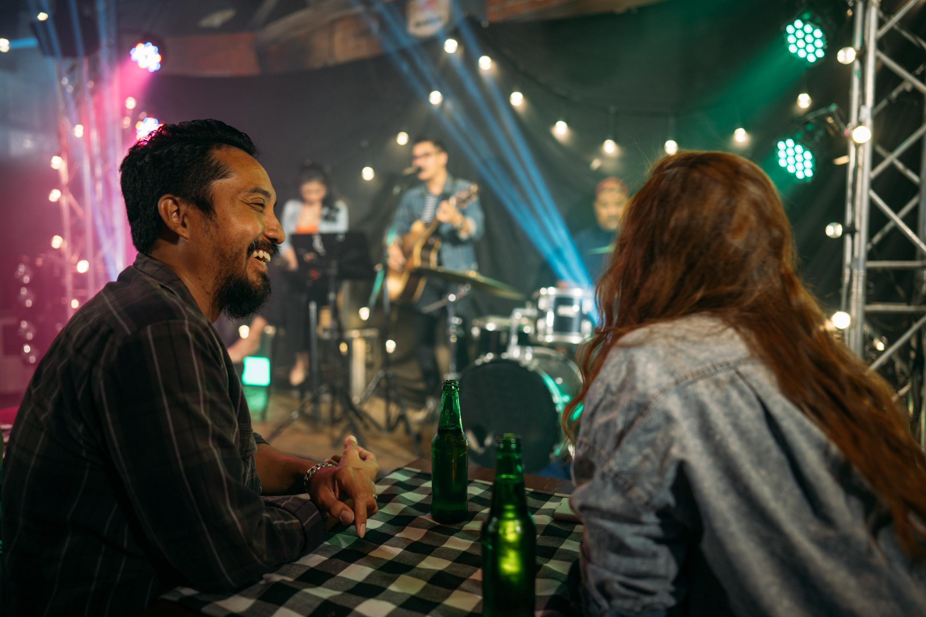 A couple at a music venue