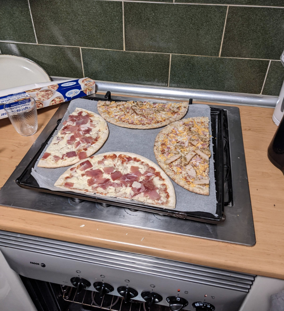 Pizzas on an oven tray