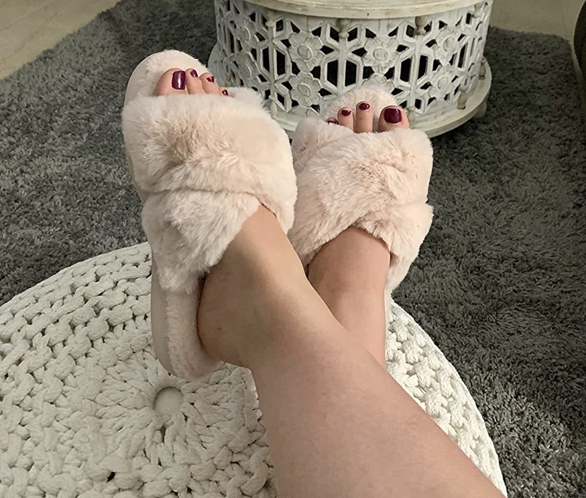 Reviewer wearing fuzzy slippers