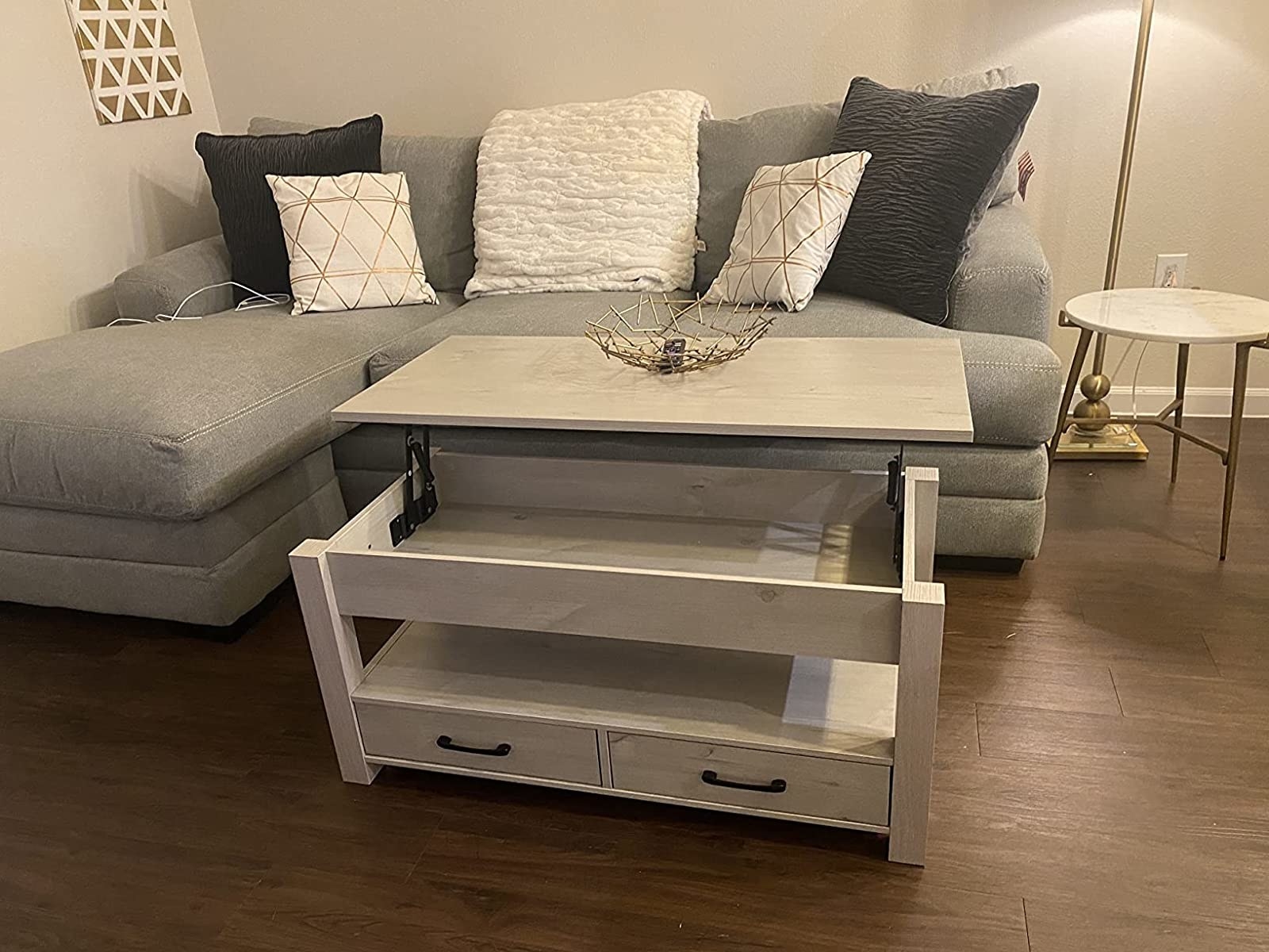 Reviewer image of lift-top coffee table in a gray and white living room
