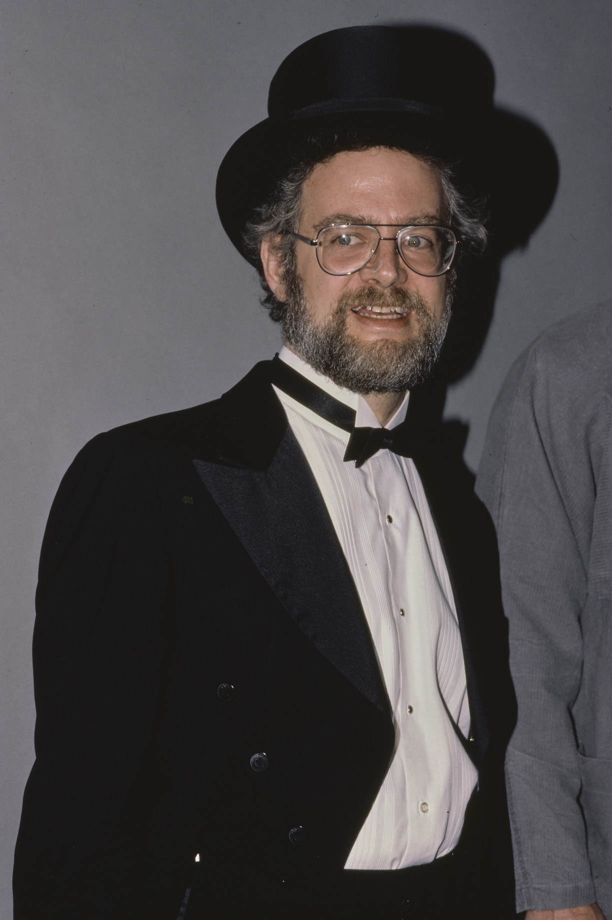 closeup of Dr. Demento in a top hat and wired glasses