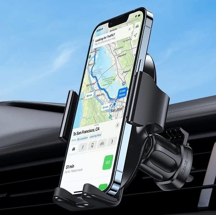 a phone in a phone holder in a car
