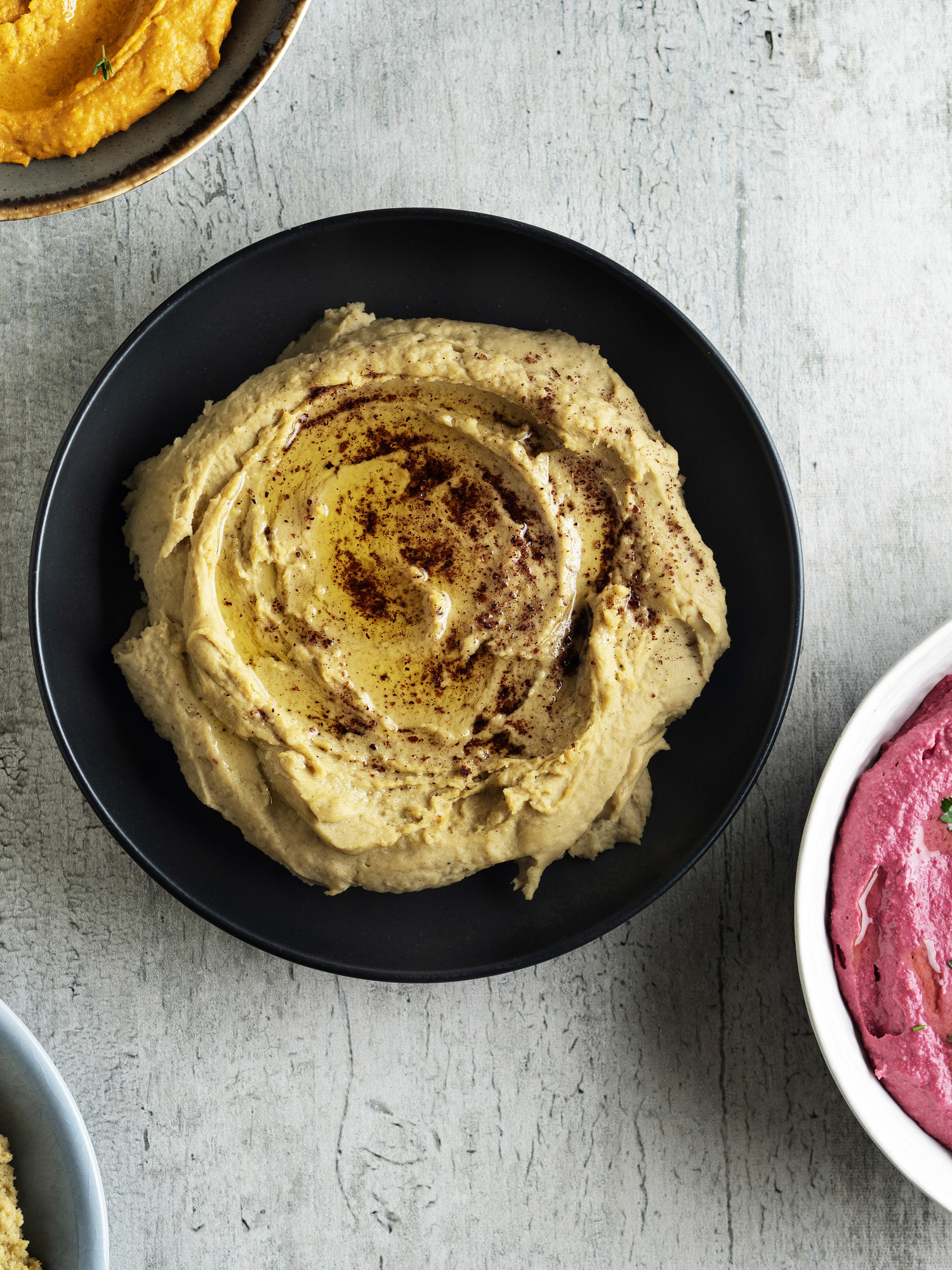 Hummus topped with sumac.