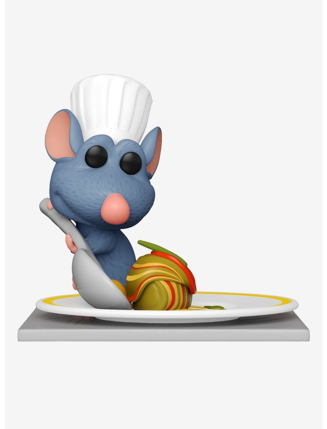 a funko pop of remy plating ratatouille