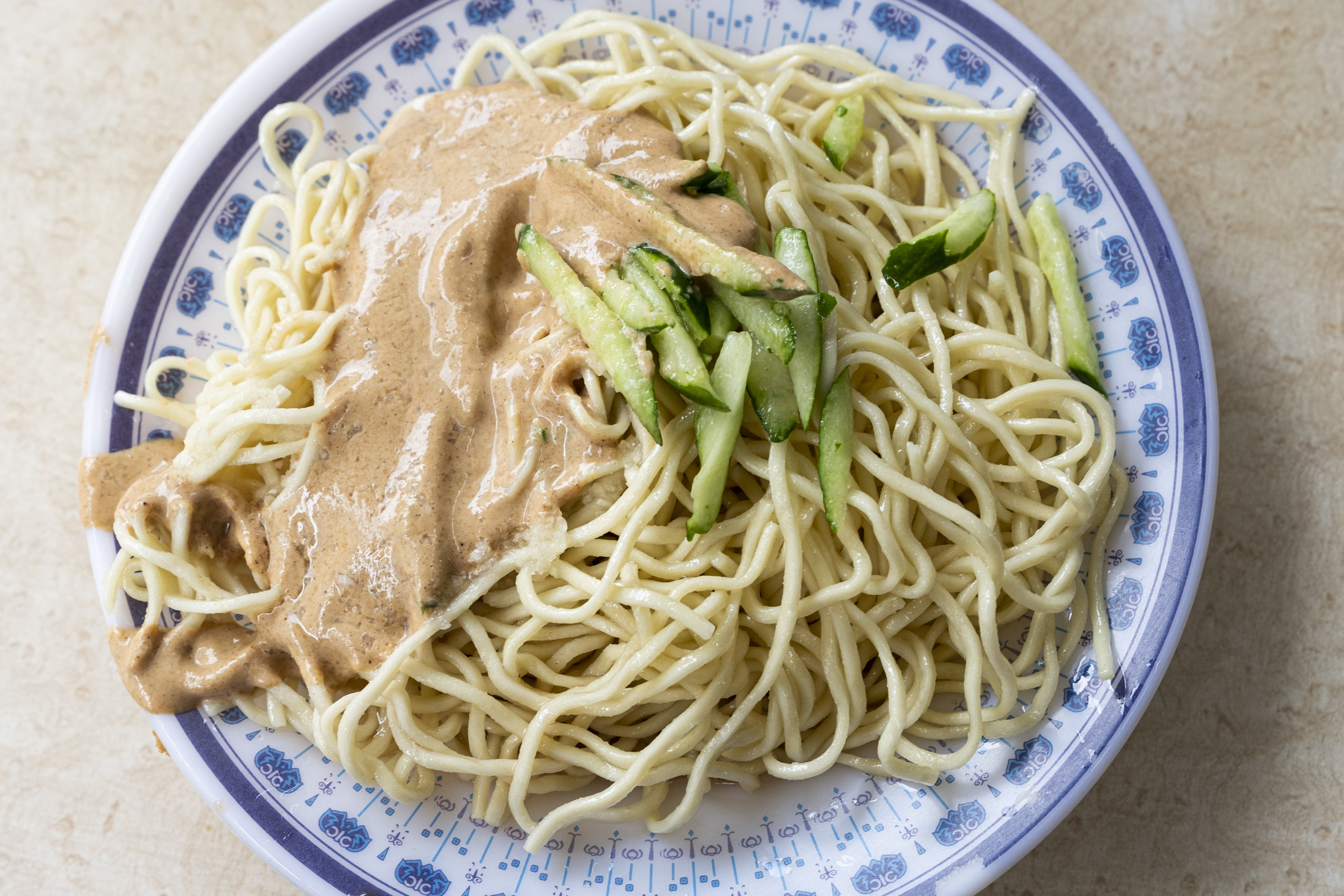 Cold sesame noodles with cucumber.