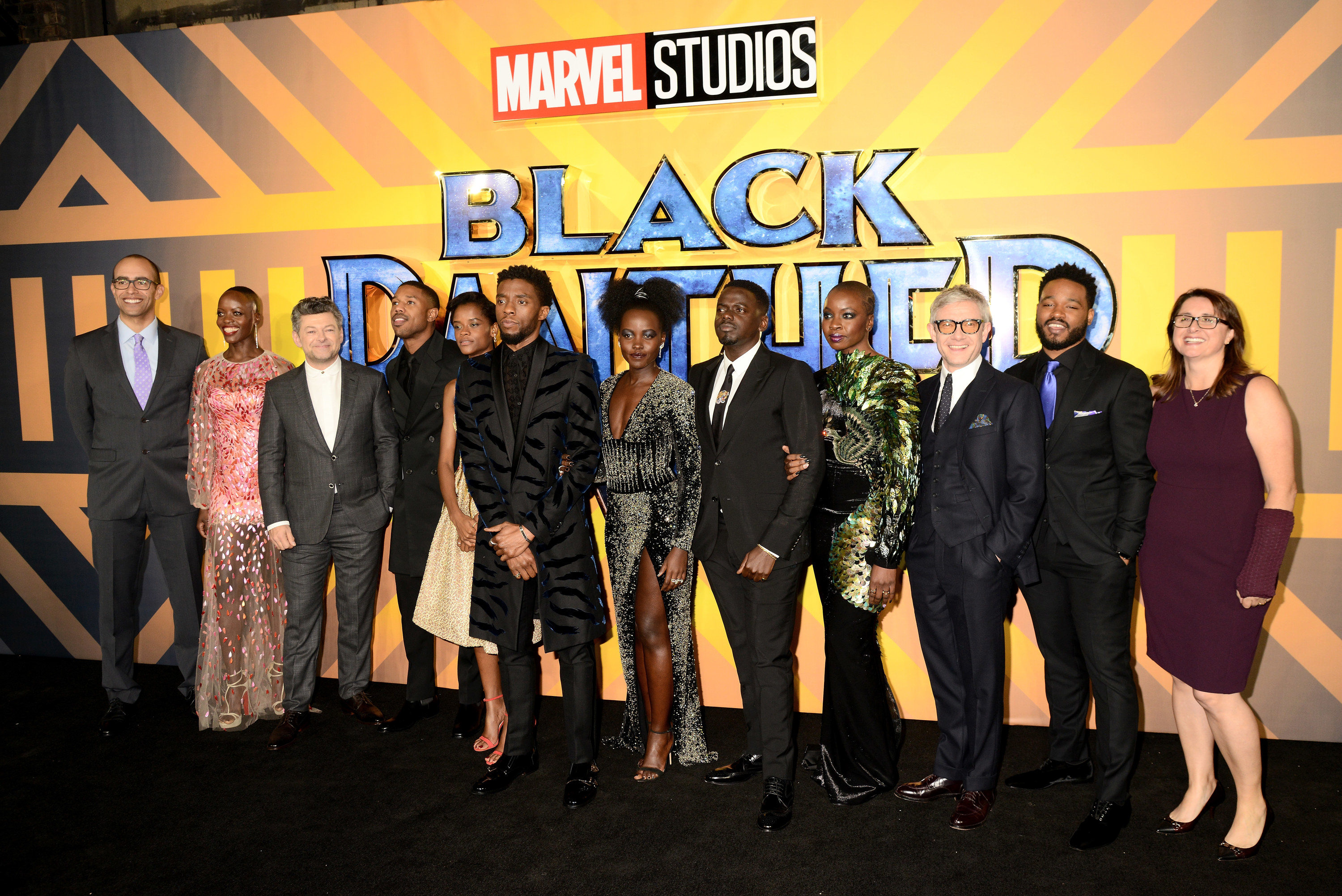 The cast of the first Black Panther pose for a group photo