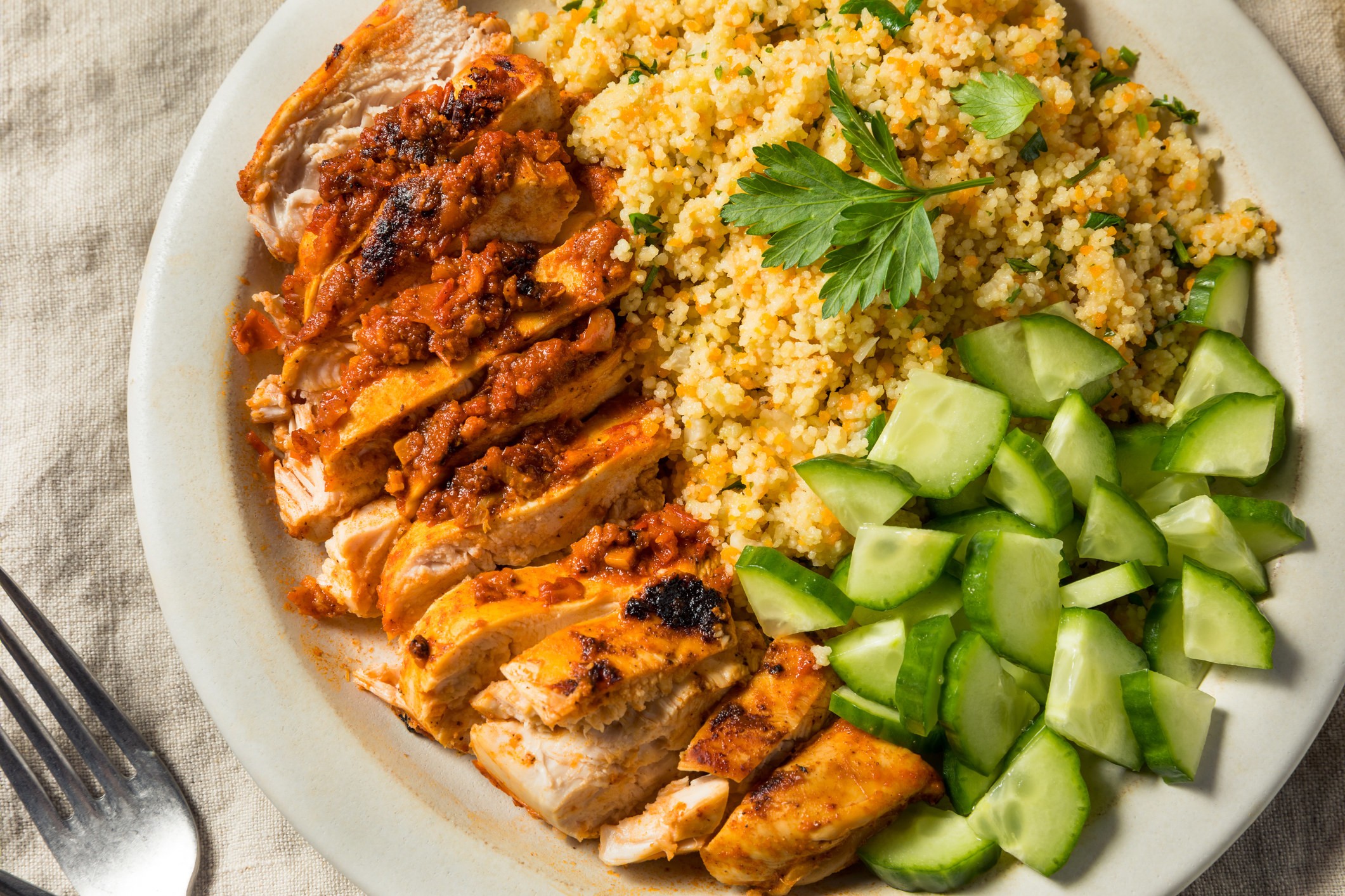 Harissa chicken with couscous and cucumber.