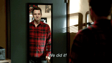 GIF of Jake Johnson as Nick Miller in New Girl doing thumbs up in the mirror: &quot;We did it!&quot;