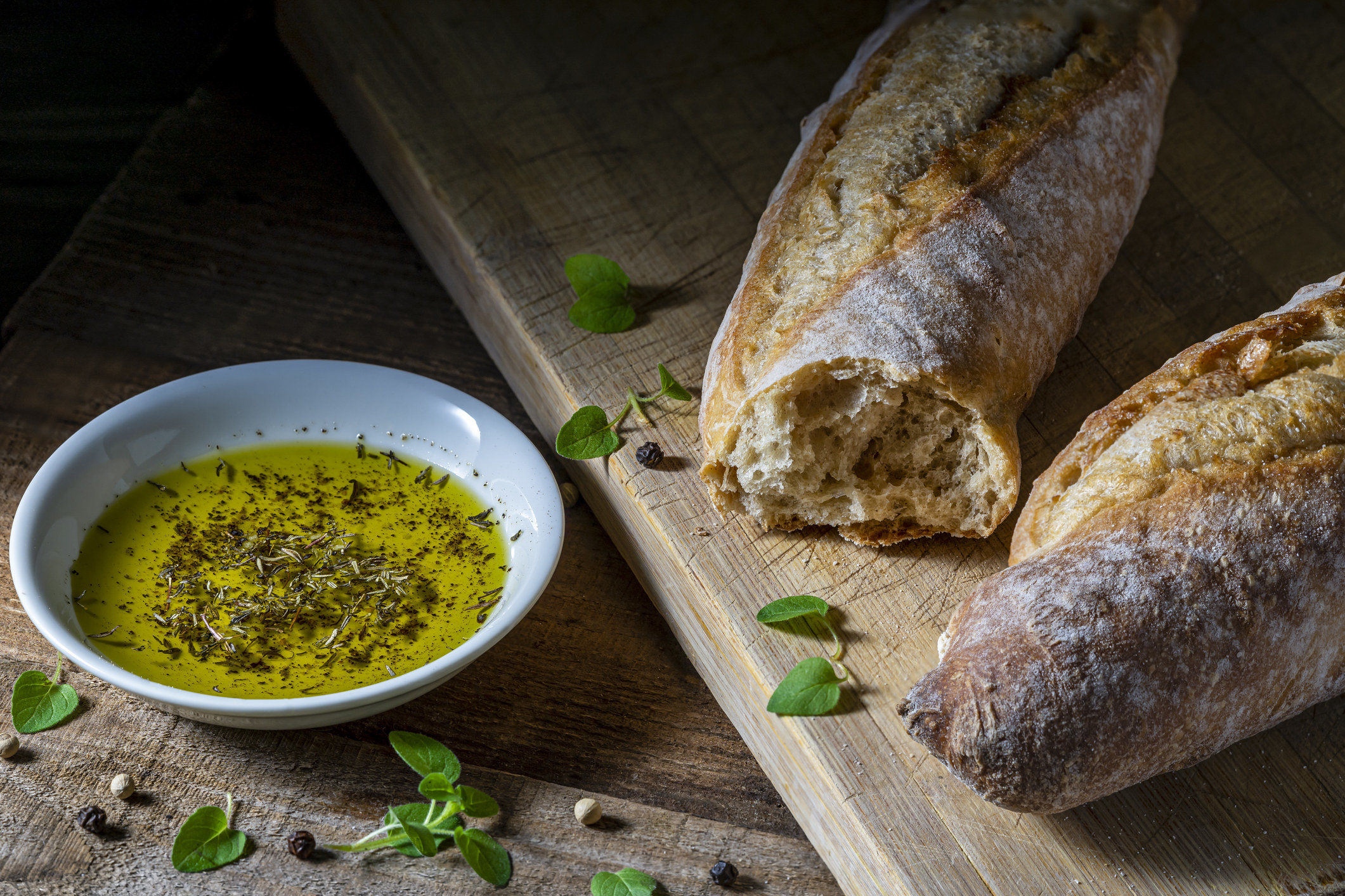 A baguette and olive oil for dipping