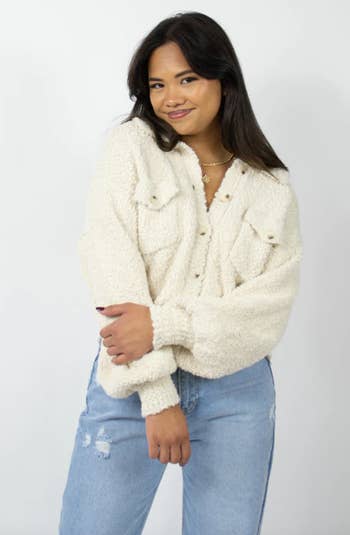 front view of a model in the cream collared cardigan