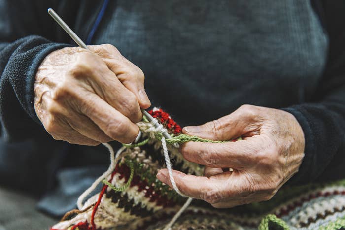 Close-up of person crocheting
