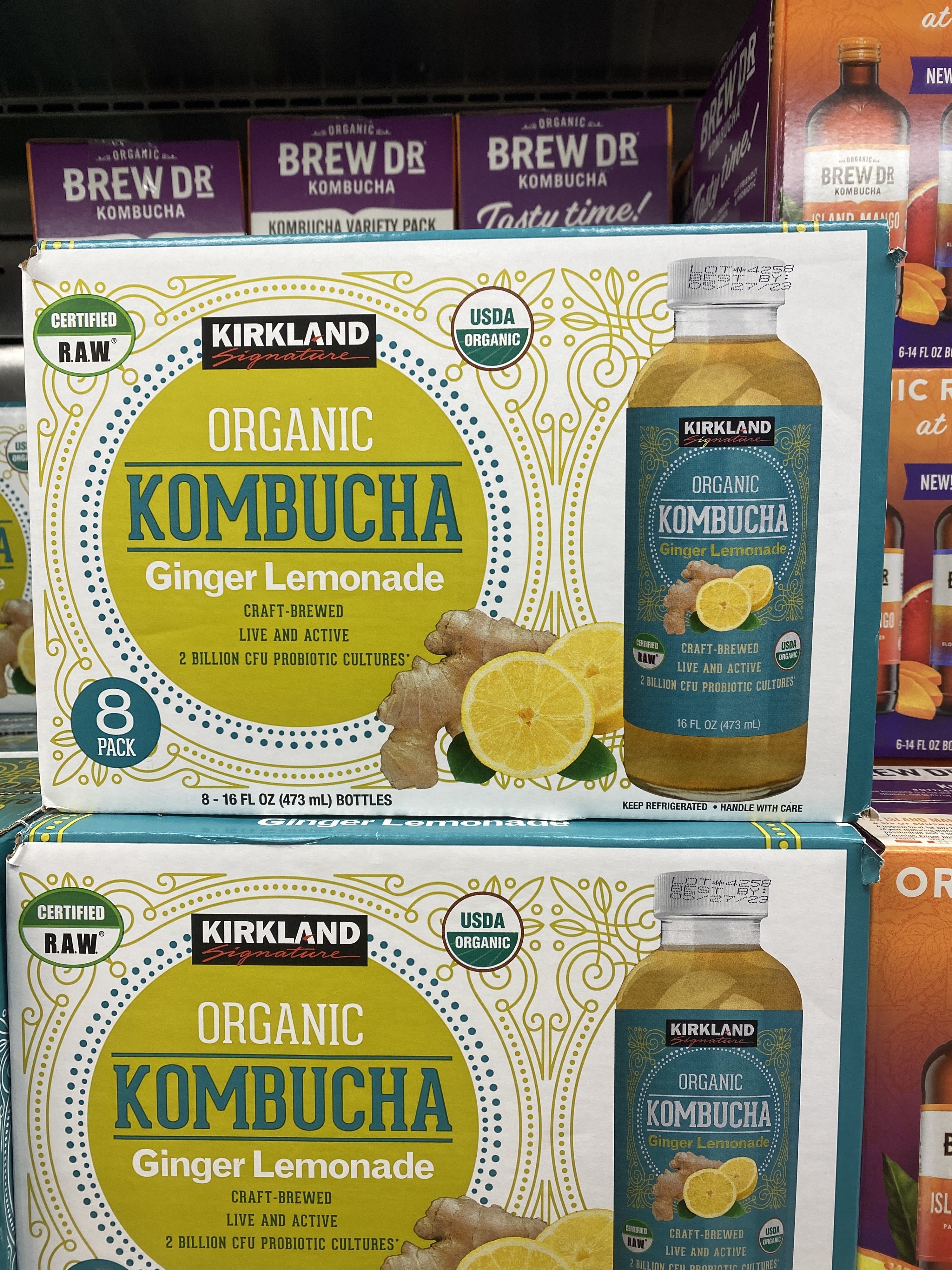 stacked boxes of kombucha