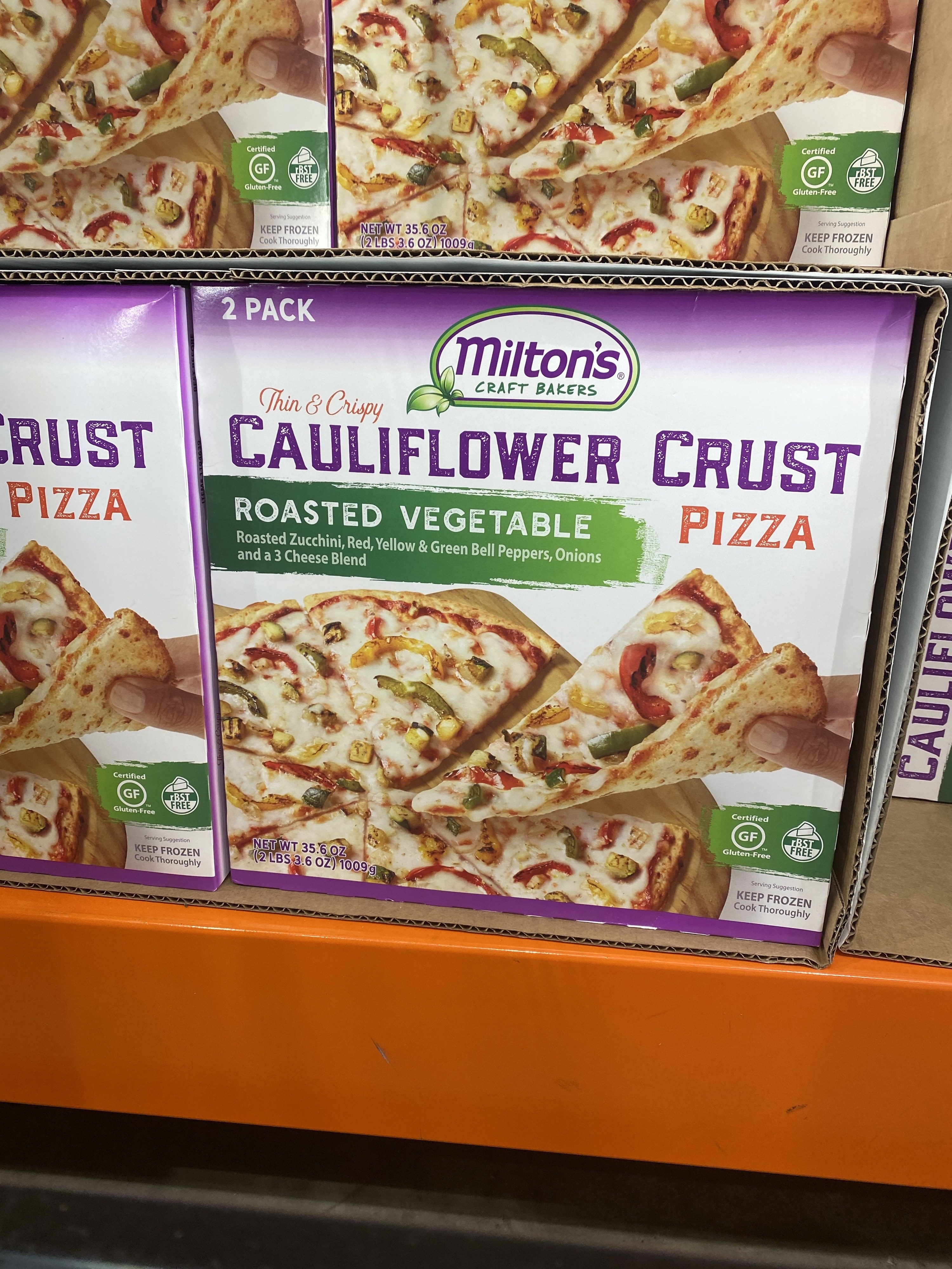 boxes of cauliflower crust pizza