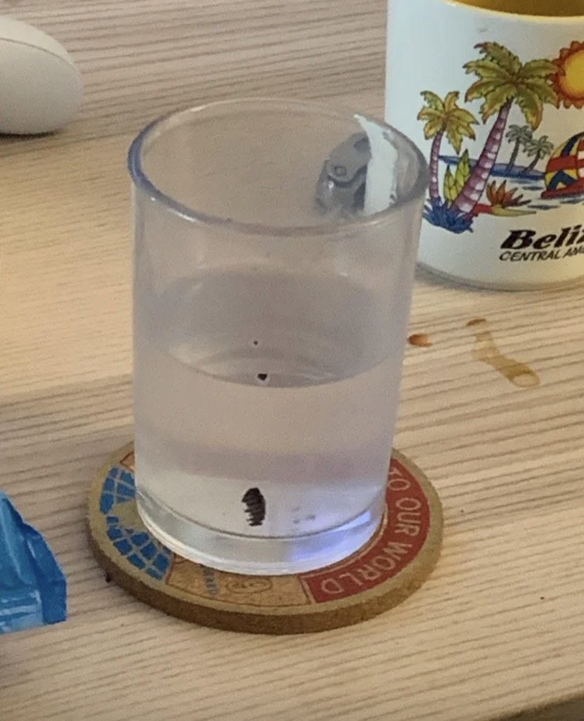 oreo crumb in a glass of water