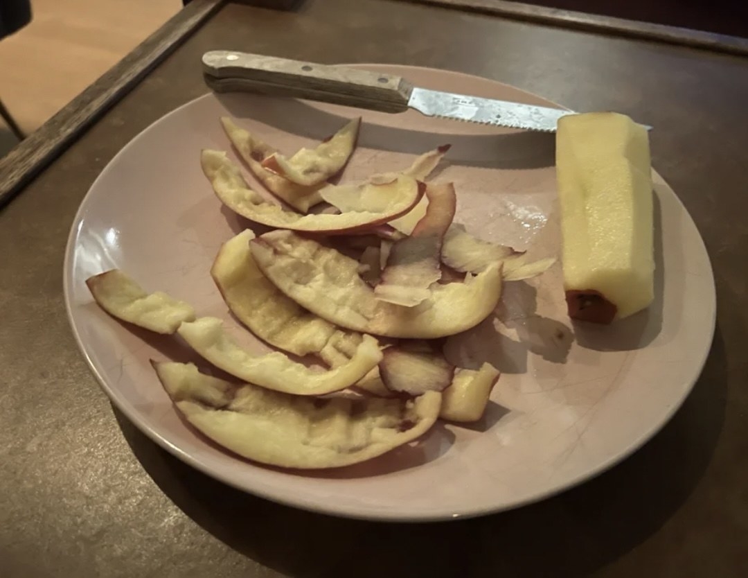 apple cut in slivers with the peel left behind