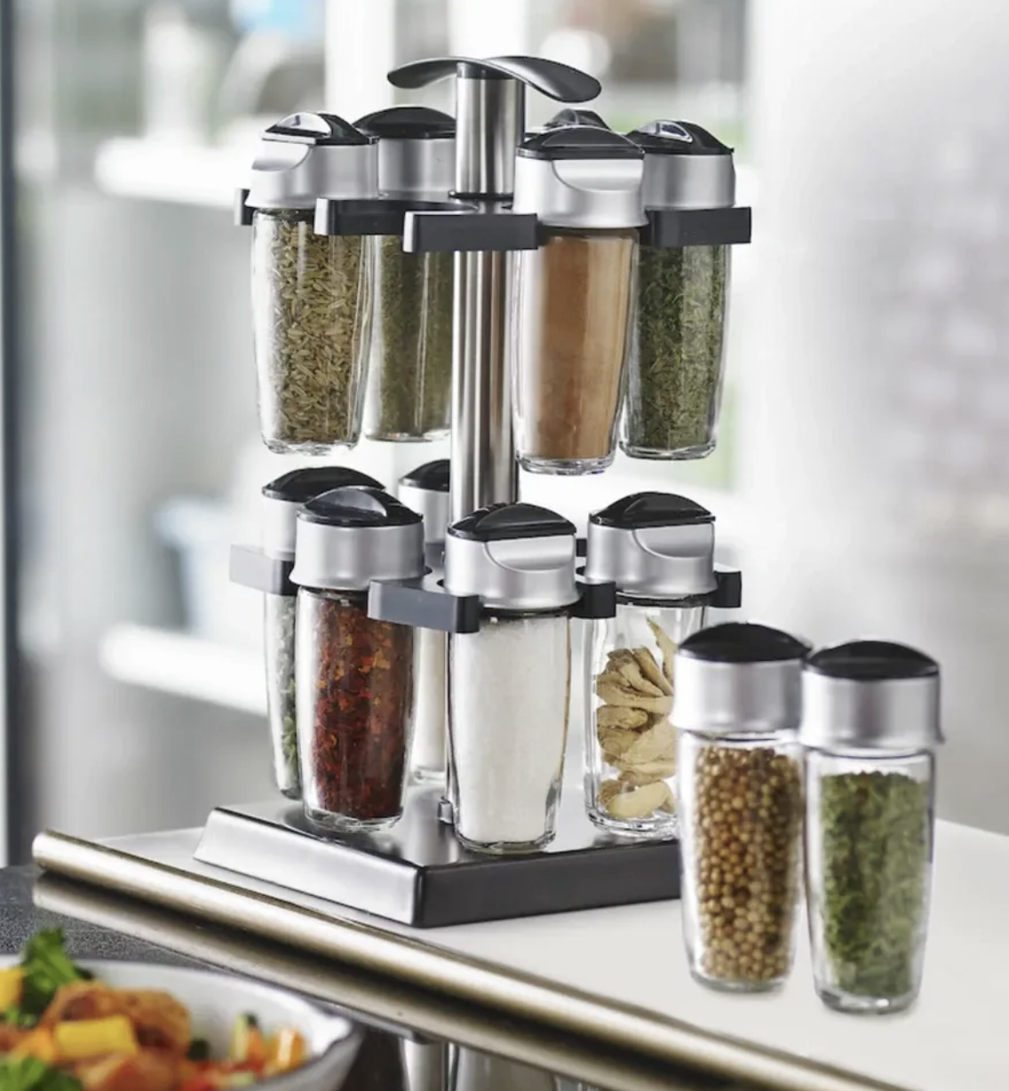 the spice rack on a kitchen counter