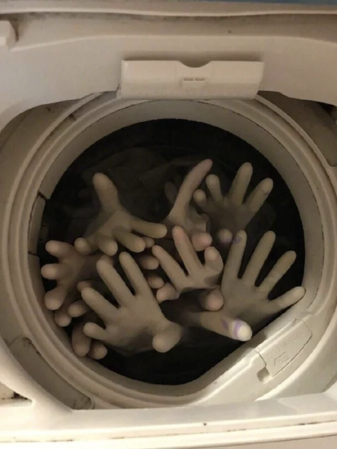 A bunch of hands in a dryer