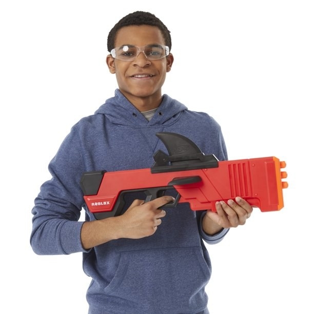 Boy holding Nerf blaster