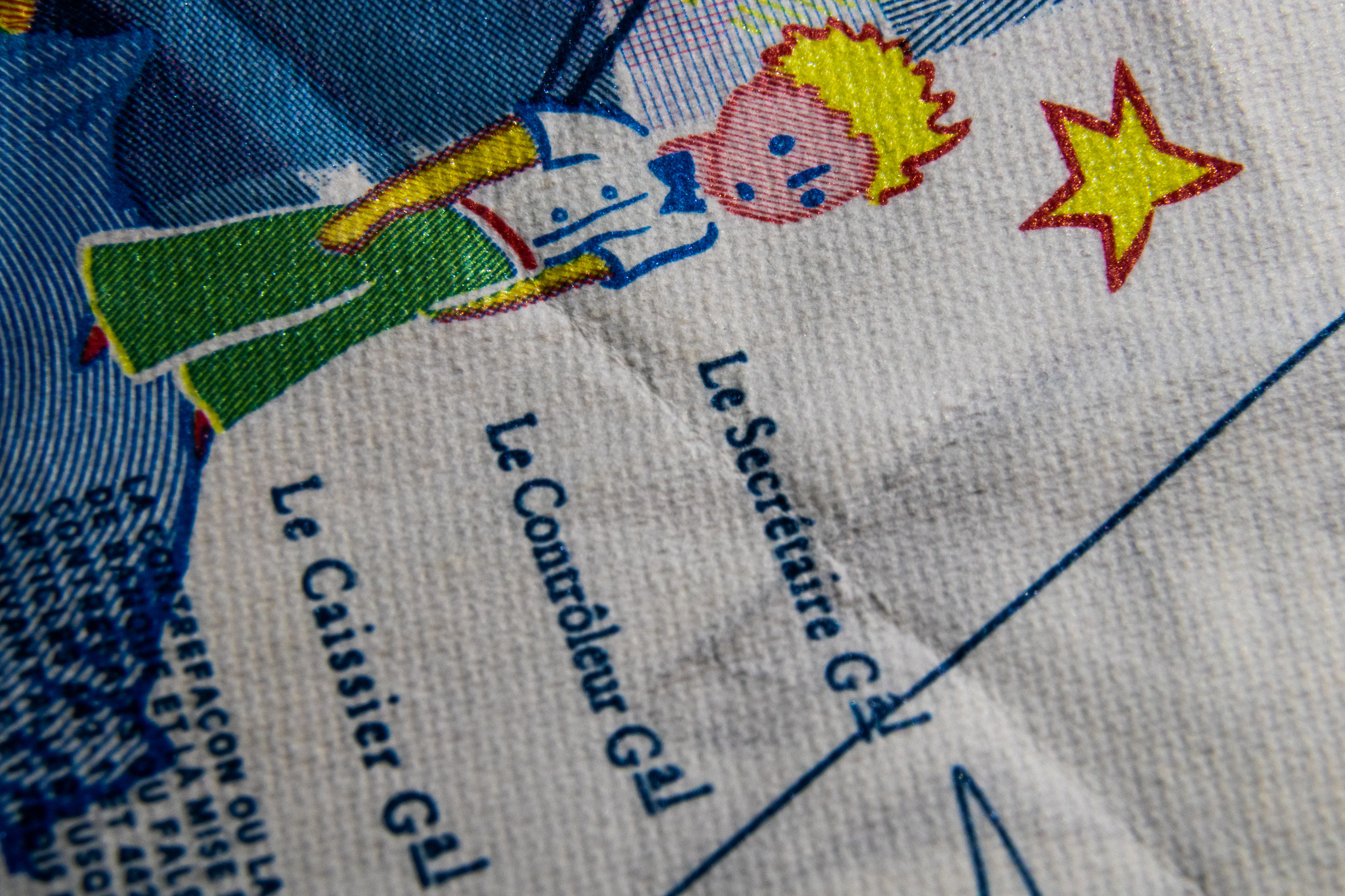 Closeup of a little cartoon boy with a star over his head
