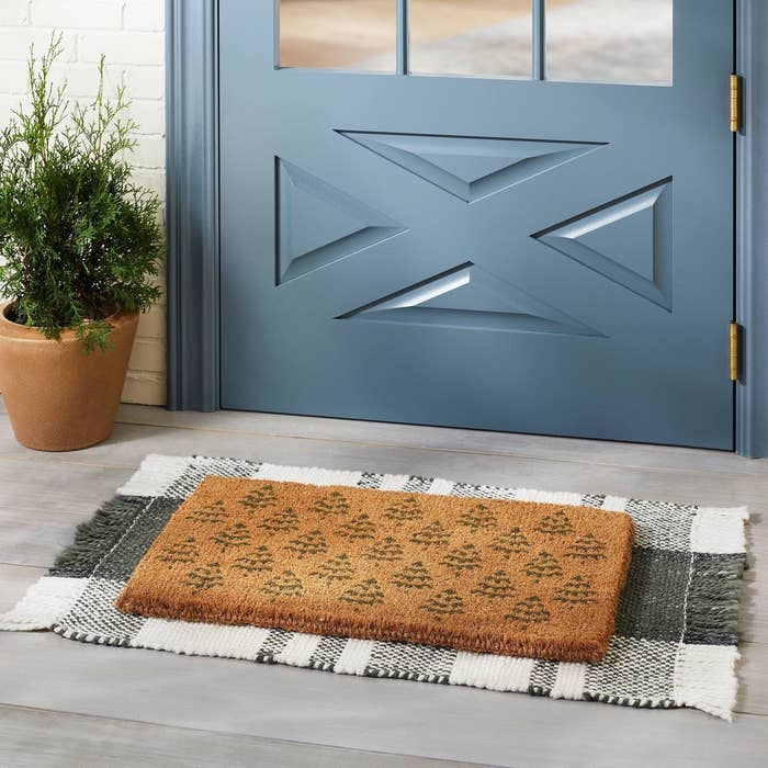 The doormat outside a door