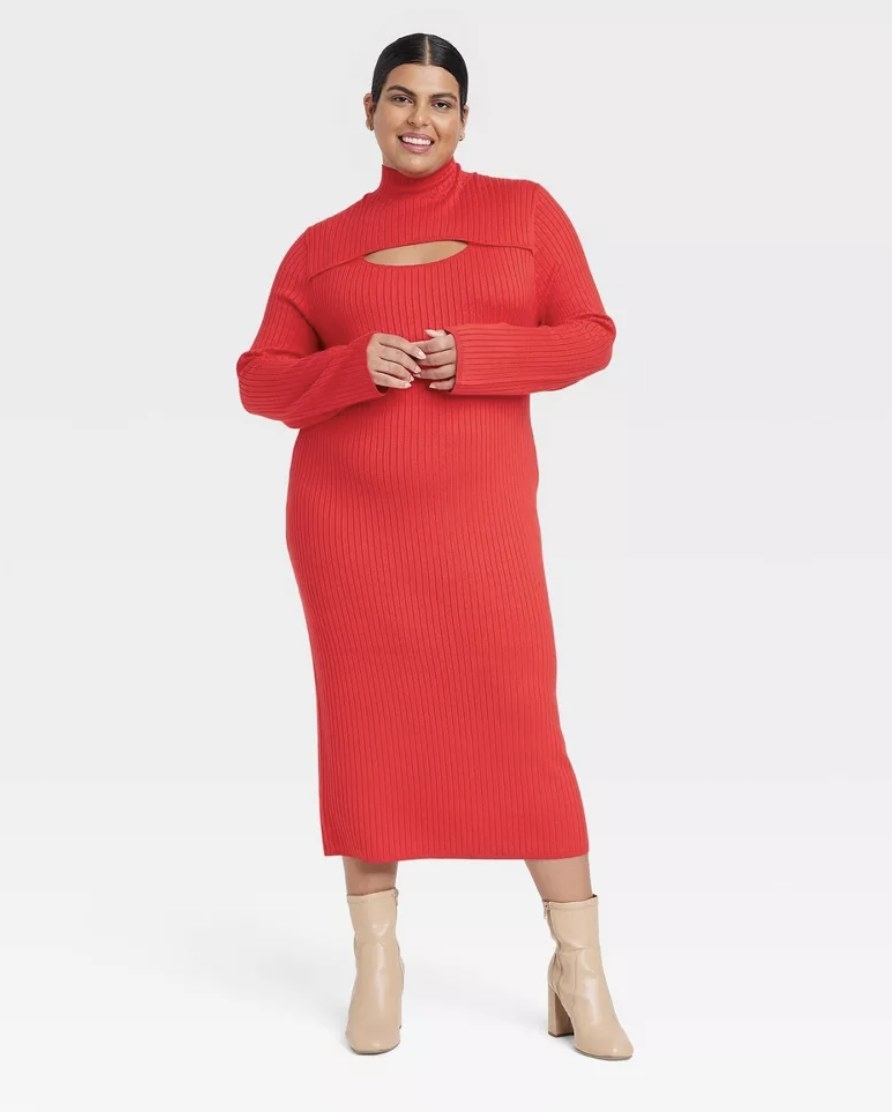 A long red cut out sweater dress