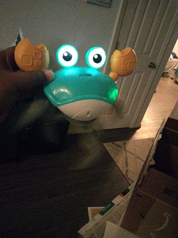 reviewer's photo of the crab lit up
