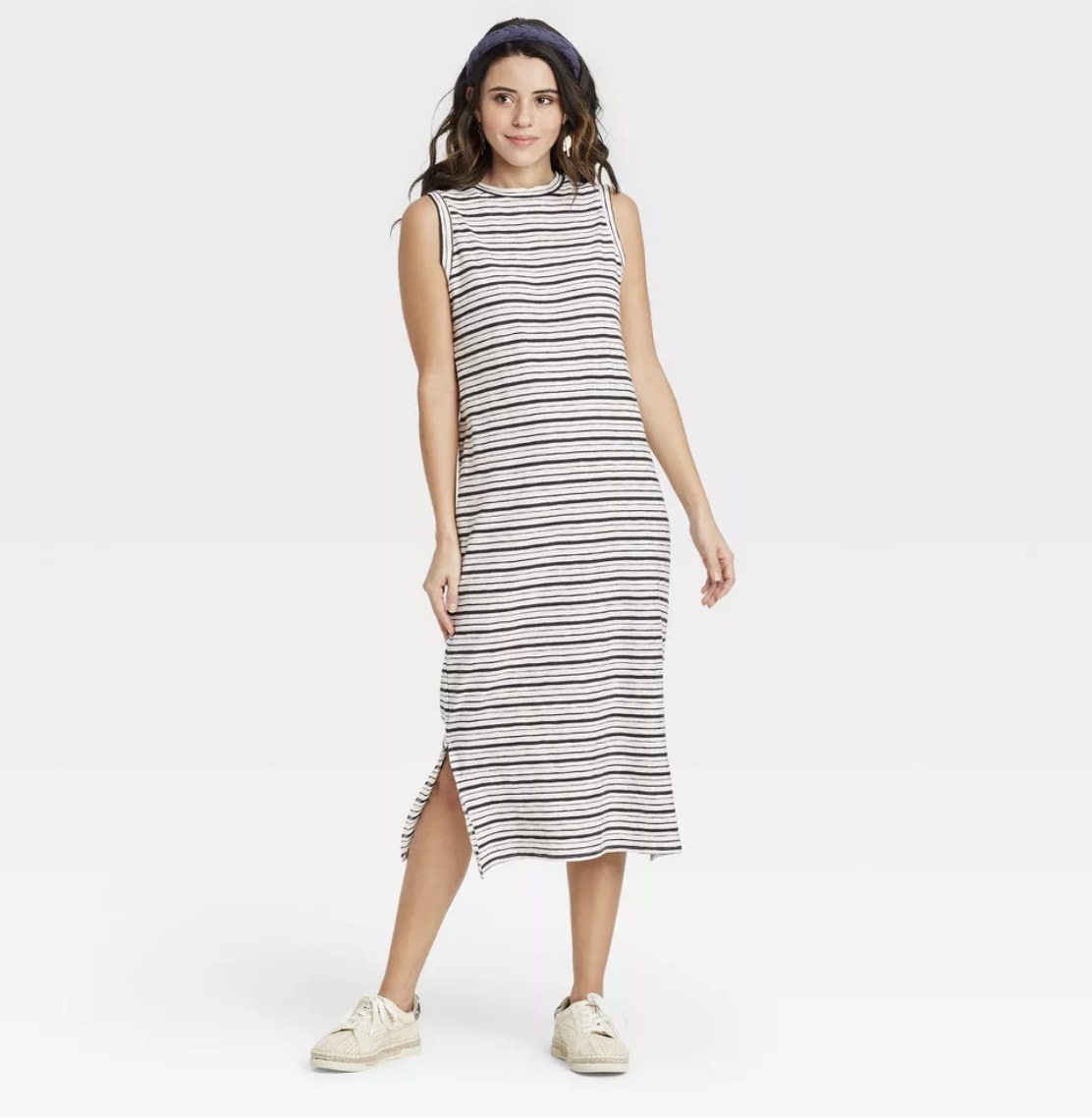 A striped cream sleeveless maxi dress