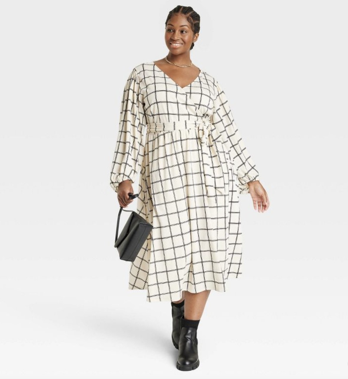 A cream and black checked long wrap dress