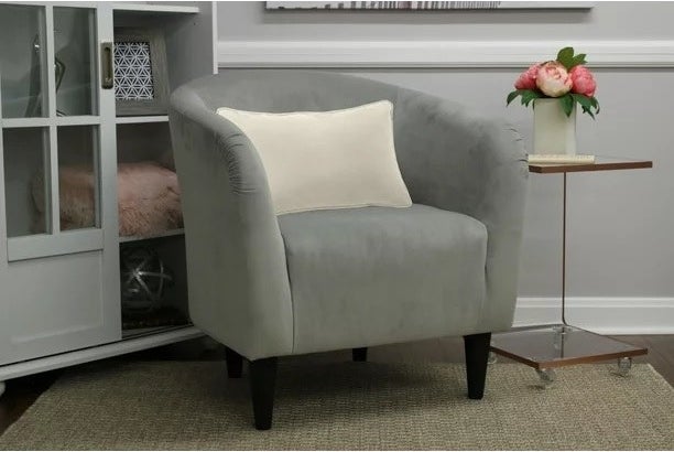 The accent chair in the dove gray color